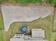 Aerial view of the backyard with a trampoline and a gravel area at 3748 Spring Place Ct, Loganville, GA 30052