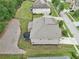 Aerial view of the backyard, fence, and retaining wall at 3748 Spring Place Ct, Loganville, GA 30052
