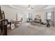 This bonus room features a ceiling fan, neutral walls, and could be easily converted into a gym or office at 3748 Spring Place Ct, Loganville, GA 30052