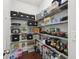 Organized pantry with wire shelving, offering ample storage space for groceries and household items at 3748 Spring Place Ct, Loganville, GA 30052