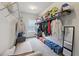 The walk-in closet offers wire racks, ample storage space, and a full length mirror at 3748 Spring Place Ct, Loganville, GA 30052