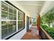 Inviting covered front porch featuring wood railings and a charming front door at 20 S Eugenia Nw Pl, Atlanta, GA 30318