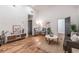 Bright living room with hardwood floors, vaulted ceiling, and modern furnishings at 20 S Eugenia Nw Pl, Atlanta, GA 30318