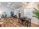 Open living space combining dining, kitchen and living area with hardwood floors at 20 S Eugenia Nw Pl, Atlanta, GA 30318