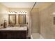 Bathroom featuring double vanity with granite countertop and tile shower/tub at 2747 Harper Woods Dr, Marietta, GA 30062