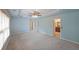 Large bedroom with sitting area, tray ceiling and attached bathroom at 2747 Harper Woods Dr, Marietta, GA 30062
