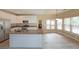 Well-lit kitchen with stainless steel appliances, granite countertops, and an eat-in area at 2747 Harper Woods Dr, Marietta, GA 30062