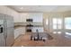 Well-equipped kitchen with stainless steel appliances, granite countertops, and ample cabinet space at 2747 Harper Woods Dr, Marietta, GA 30062