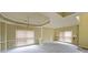 Bright living room showcasing gray carpet, large windows, and neutral wall paint at 2747 Harper Woods Dr, Marietta, GA 30062