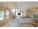 Open concept kitchen and living room showcasing cohesiveness and natural light at 2747 Harper Woods Dr, Marietta, GA 30062
