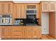 Kitchen with wooden cabinets and sleek countertops at 3113 Brians Creek Se Dr, Conyers, GA 30013