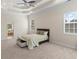 Spacious primary bedroom features a trey ceiling, neutral walls, and large windows at 3113 Brians Creek Se Dr, Conyers, GA 30013