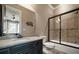 Bathroom featuring a shower-tub combination with black framed sliding glass doors at 3155 Wills Mill Rd, Cumming, GA 30041