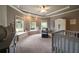 Well-lit Bedroom with a window seat and a neutral color palette at 3155 Wills Mill Rd, Cumming, GA 30041