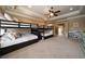 Spacious ' bedroom with carpet and two bunk beds, plus lots of storage space at 3155 Wills Mill Rd, Cumming, GA 30041