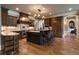 Gourmet kitchen with custom cabinetry, granite countertops, and stainless steel appliances at 3155 Wills Mill Rd, Cumming, GA 30041