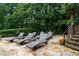 Beautiful outdoor deck with chaise lounges for relaxing by the pool at 3155 Wills Mill Rd, Cumming, GA 30041