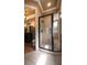 A modern shower showcases a glass enclosure, a built-in bench, and neutral tiling for a spa-like experience at 3155 Wills Mill Rd, Cumming, GA 30041