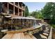 Unique stone waterfall feature flowing into a serene stream and pond at 3155 Wills Mill Rd, Cumming, GA 30041