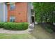 Apartment building with brick and siding, surrounded by greenery at 514 Mcgill Ne Pl, Atlanta, GA 30312