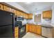 Kitchen with stainless steel appliances, ample cabinets, and tile flooring at 514 Mcgill Ne Pl, Atlanta, GA 30312