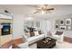 Cozy living room featuring a dining area, hardwood floors, and natural light at 514 Mcgill Ne Pl, Atlanta, GA 30312