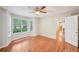 Cozy living room boasts hardwood floors, natural light, and open doorway at 514 Mcgill Ne Pl, Atlanta, GA 30312