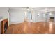 Open living room with wood floors and fireplace with ample natural light at 514 Mcgill Ne Pl, Atlanta, GA 30312