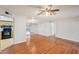 Open living room with wood floors, dining area, and kitchen access at 514 Mcgill Ne Pl, Atlanta, GA 30312