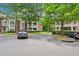 Designated parking lot with numbered spaces near apartment buildings at 514 Mcgill Ne Pl, Atlanta, GA 30312