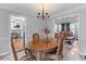Open dining room offers seamless flow, views to living room, perfect for entertaining guests and Gathering gatherings at 564 Allana Ct, Stone Mountain, GA 30087