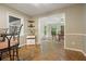 View of breakfast nook with wainscoting and access to dining area at 5770 Dorsett Shoals Rd, Douglasville, GA 30135