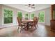 The dining room has an abundance of natural light and views of the backyard at 5770 Dorsett Shoals Rd, Douglasville, GA 30135