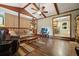 Inviting living room featuring hardwood floors that lead to a dining area at 5770 Dorsett Shoals Rd, Douglasville, GA 30135