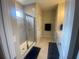 A bright bathroom with a glass shower, dual sinks, and gray walls at 209 Ellis Ln, Woodstock, GA 30189