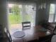 Cozy dining area with sliding glass doors that open to the backyard at 209 Ellis Ln, Woodstock, GA 30189