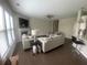 Open concept living room with hardwood floors and modern decor at 209 Ellis Ln, Woodstock, GA 30189