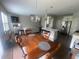 Open concept living space showcases stylish lighting and seamless flow to the kitchen at 209 Ellis Ln, Woodstock, GA 30189
