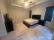 Spacious main bedroom with a tray ceiling, plush carpeting, and large windows at 209 Ellis Ln, Woodstock, GA 30189