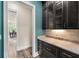 Convenient butler pantry with custom cabinets and ample counter space at 7519 Waterview Cv, Douglasville, GA 30135