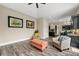 Living room with custom cabinets, archtectural details, and plenty of seating at 7519 Waterview Cv, Douglasville, GA 30135