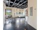 Open floor plan featuring high ceilings, large windows, and modern industrial design elements at 878 Ne Peachtree Ne St # 326, Atlanta, GA 30309