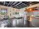 Open floor plan featuring high ceilings, large windows, and modern industrial design elements at 878 Ne Peachtree Ne St # 326, Atlanta, GA 30309