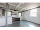 Unfinished basement featuring laundry hookups and painted floors at 6332 N Hampton N Dr, Atlanta, GA 30328