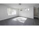 Bedroom with tiled floor, natural light, and fresh white paint at 6332 N Hampton N Dr, Atlanta, GA 30328