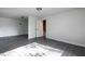 Bedroom features tiled floors, natural light, and fresh white paint at 6332 N Hampton N Dr, Atlanta, GA 30328