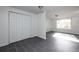 Bedroom featuring a large closet, tiled floors, and natural light at 6332 N Hampton N Dr, Atlanta, GA 30328