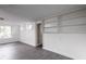 Bedroom featuring tiled floors, shelving, and natural light at 6332 N Hampton N Dr, Atlanta, GA 30328