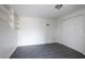 Bedroom boasts a closet, built in shelving, and tiled floors at 6332 N Hampton N Dr, Atlanta, GA 30328