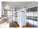 Kitchen featuring white cabinets, wood countertops, and an adjacent living area, perfect for entertaining guests at 6332 N Hampton N Dr, Atlanta, GA 30328
